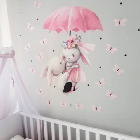 Samolepka na zeď - Zajíčci letící na deštníku